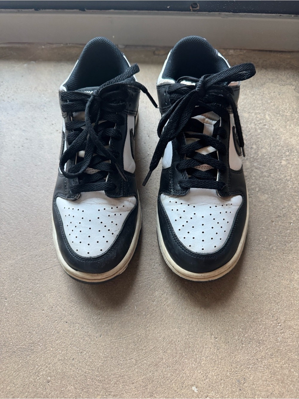 Nike Black and White Low-Top Sneakers with Classic Swoosh